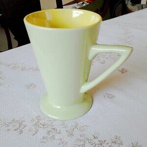 Retro style green and yellow mug near mint condition